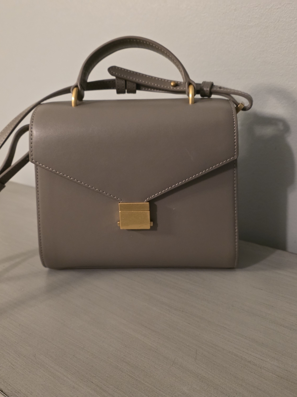 Quince Classic Taupe Leather Top-Handle Bag with Gold Hardware